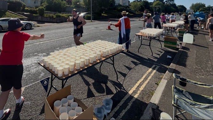 A water station at the Great West Run